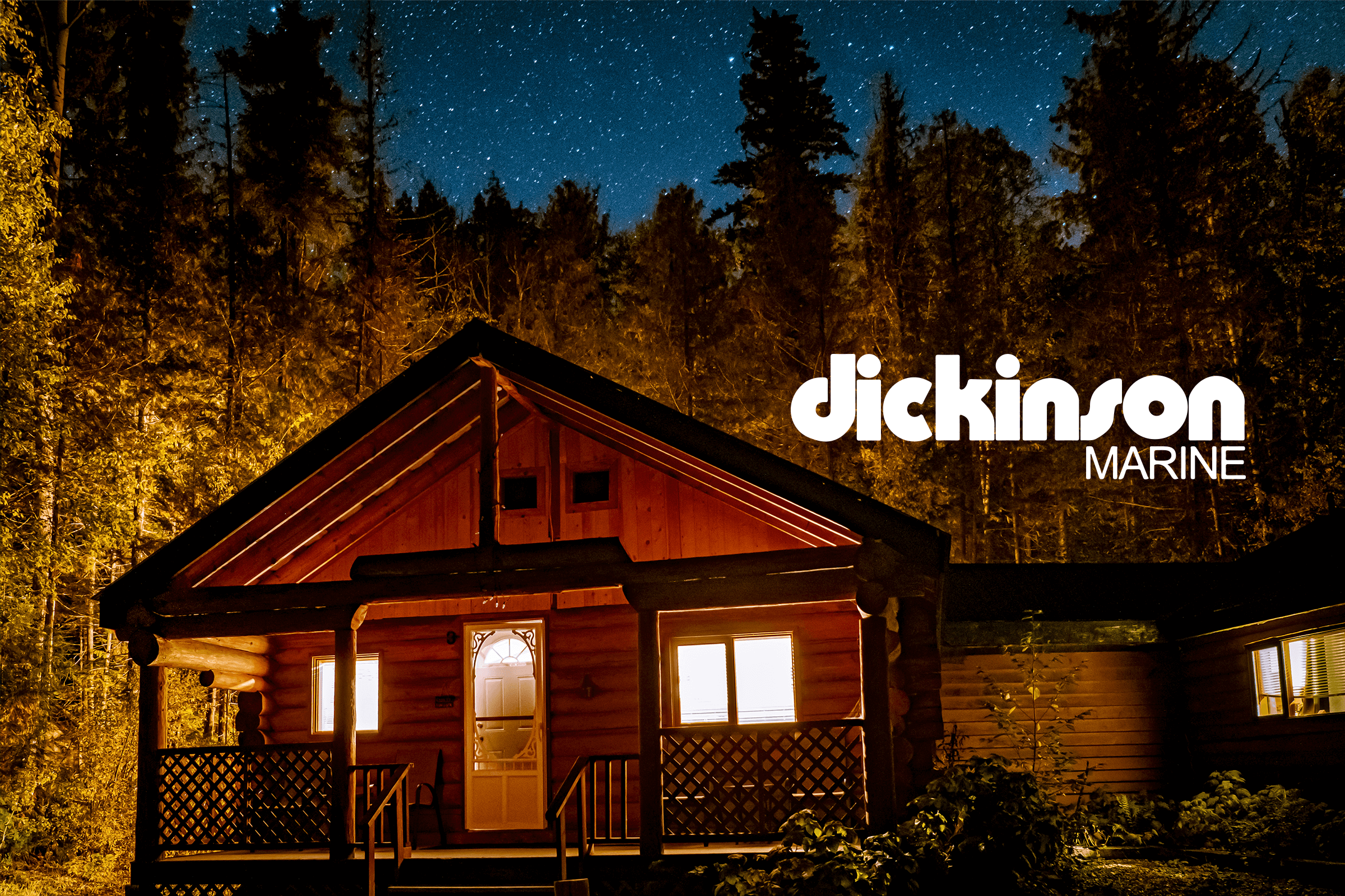 Cozy cabin in the woods at night, showcasing Dickinson Marine's off-grid distribution solutions.