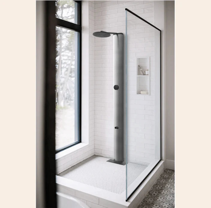 Modern bathroom with RainStick Shower in brushed nickel, showcasing energy-efficient design by Off-Grid Distribution for B2B wholesale.