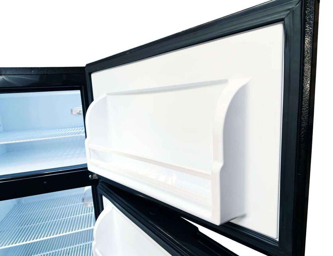 SunStar 16CU Solar/DC Refrigerator interior view with open door, highlighting spacious shelves for off-grid use by Off-Grid Distribution.