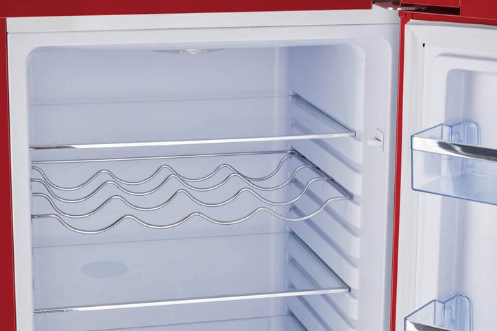 Interior view of Unique 9 cu/ft Retro AC Bottom Mount Refrigerator with shelves and door storage compartments.