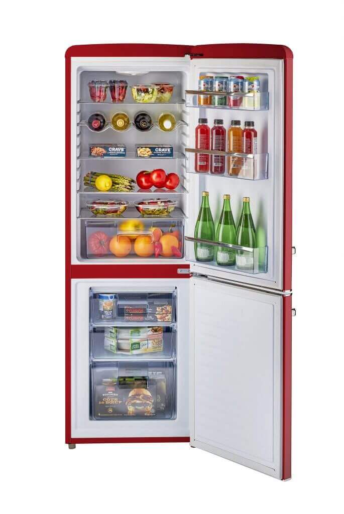 Retro 9 cu/ft bottom mount refrigerator in red with open doors showing stocked interior shelves and drawers.