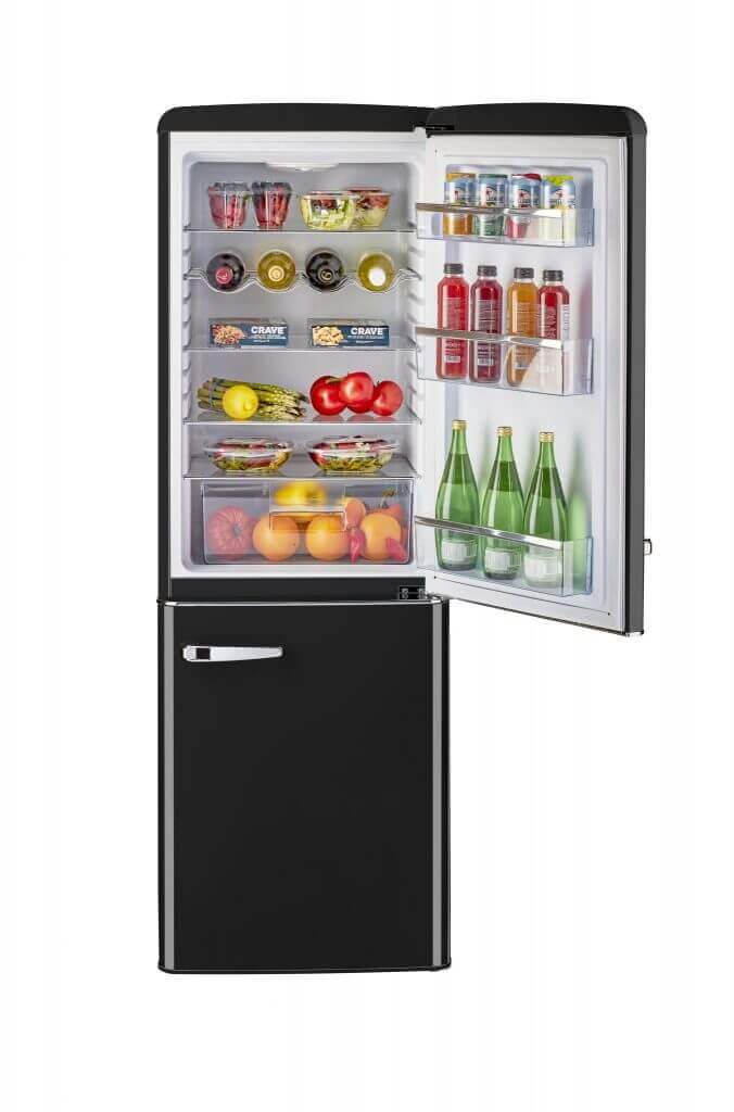 Unique 9 cu/ft Retro AC Bottom Mount Refrigerator with open door displaying stocked shelves of food and beverages.