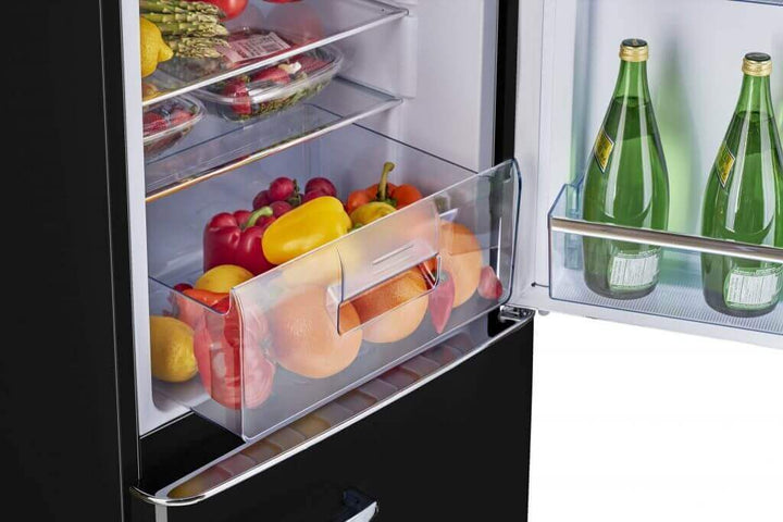 Open Unique 9 cu/ft Retro AC Bottom Mount Refrigerator showcasing fresh produce and bottled drinks in the door and crisper drawer.