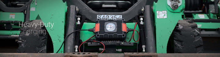 NOCO 24V 40A UltraSafe Industrial Charger on heavy machinery, ideal for off-grid or remote homes.