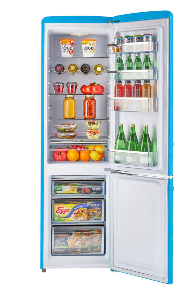 Unique retro blue refrigerator with open door, showing stocked shelves with drinks, fruits, and frozen items.