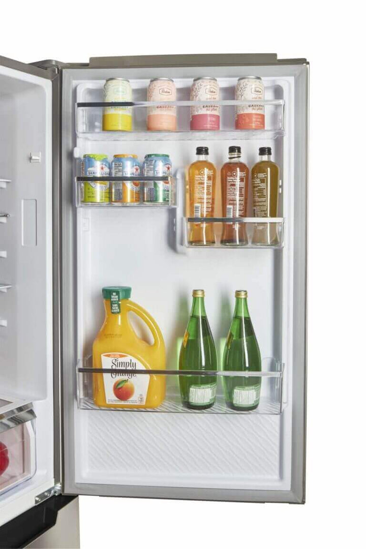 Open Unique Prestige refrigerator door showing well-organized shelves with beverages and condiments.