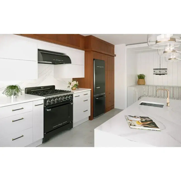 Retro kitchen with Unique 36” Classic Pro Convection Gas Range, matching refrigerator, and range hood in stylish white setting.