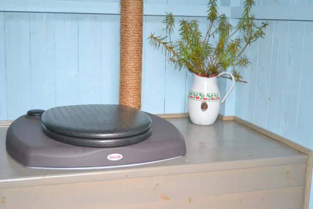 Biolan Composting ECO Toilet with thermal insulation, available at Cabin Depot; eco-friendly compost toilet setup in wooden cabin interior.