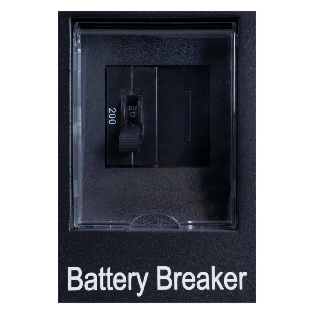 Battery breaker switch in off position with protective cover, labeled "Battery Breaker" on a black panel.