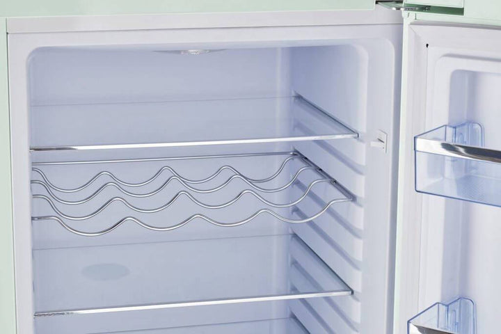 Open view of Unique 9 cu/ft Retro AC Bottom Mount Refrigerator interior with spacious racks and door shelves.