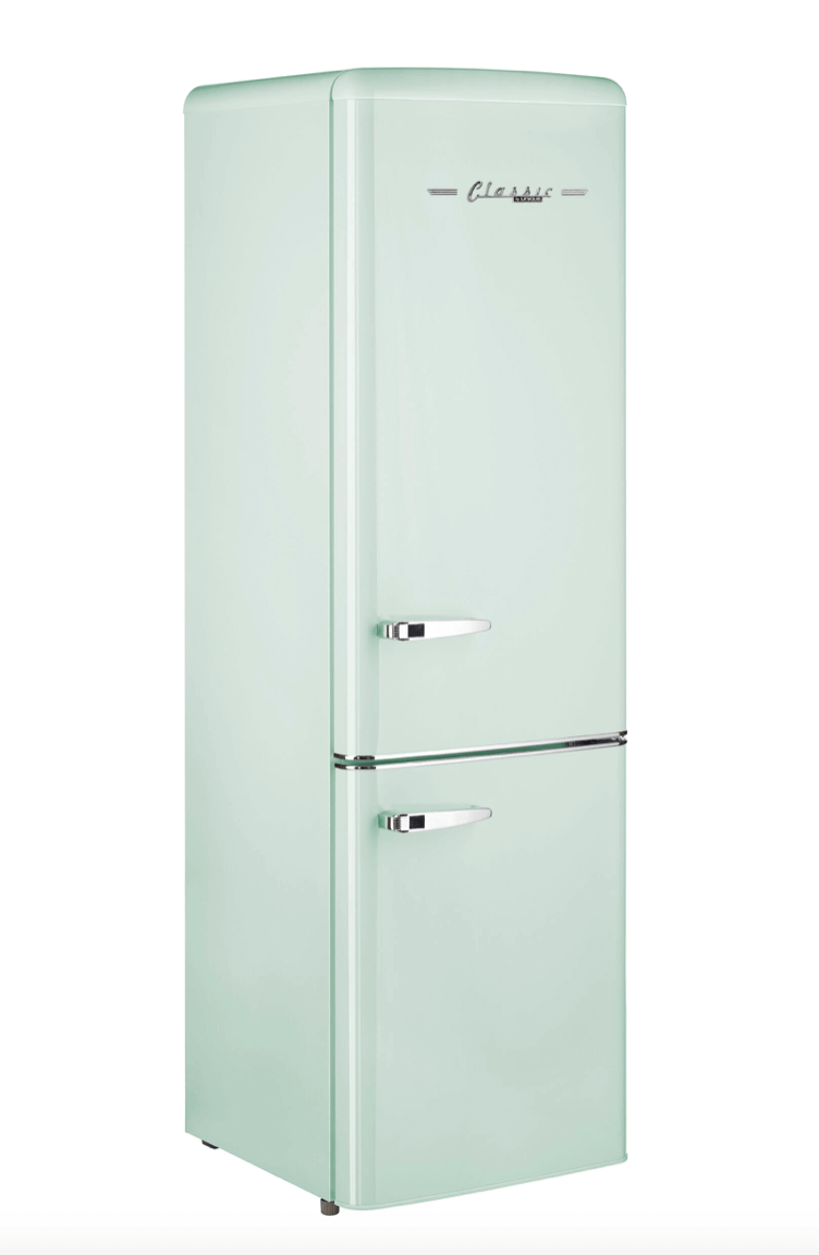 Retro-style solar-powered fridge with freezer in mint green, energy-efficient and ideal for off-grid living.