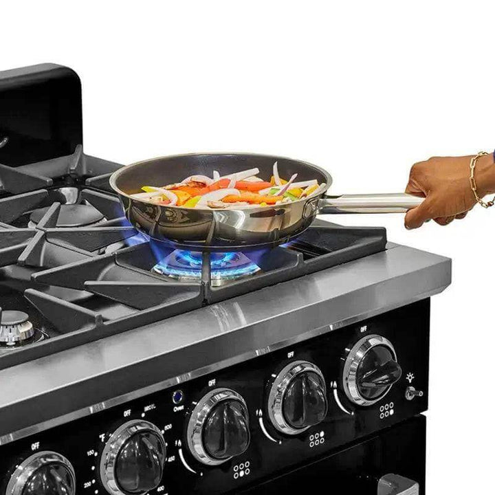 Cooking vegetables on the UNIQUE Classic Retro 36” Pro Convection Gas Range with retro design and chrome accents.