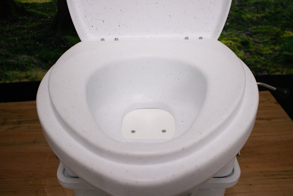 Nature's Head Composting Toilet by Off-Grid Distribution for eco-friendly sanitation solutions.